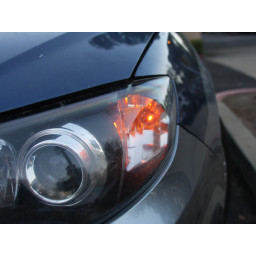 Как заменить лампочку переднего поворота в Subaru Impreza Outback Sport 2011 года